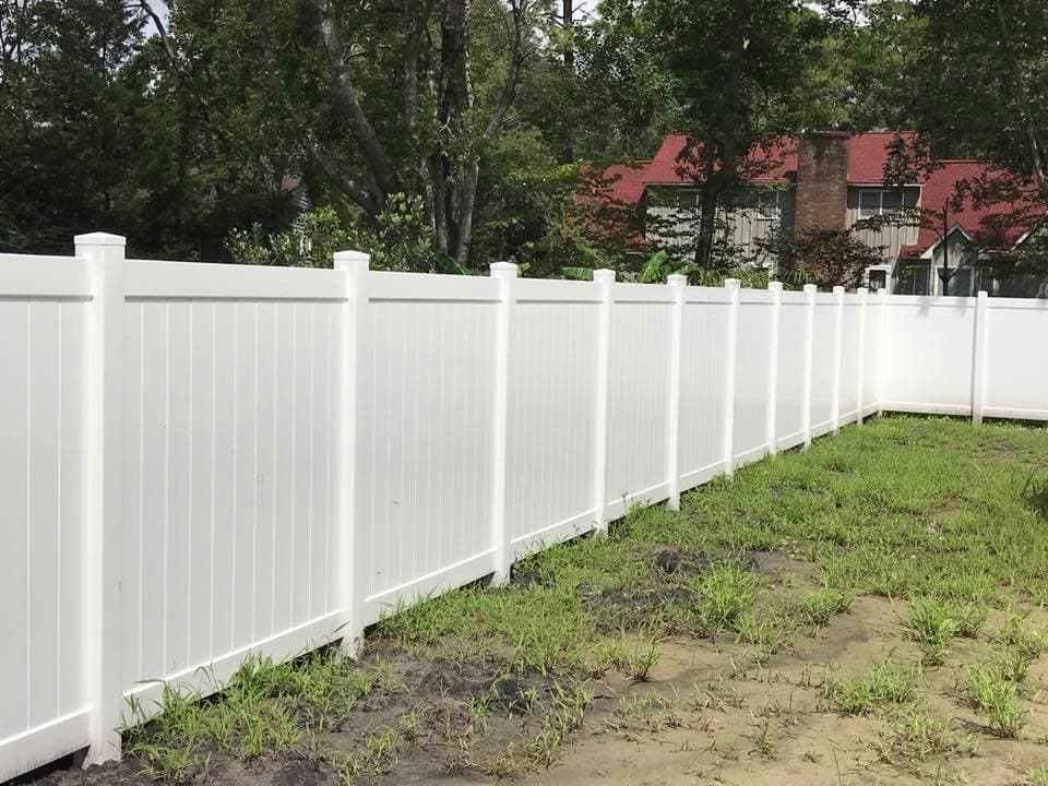 White vinyl privacy fence by Davis Fence