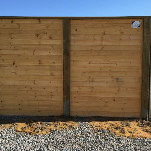 commercial wood fencing enclosure