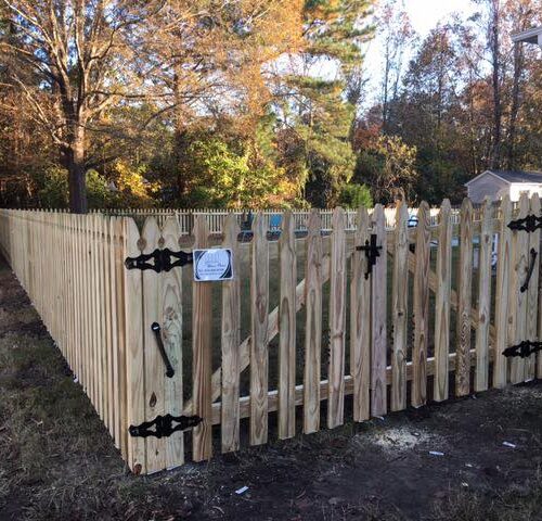 picket wood fence with gate