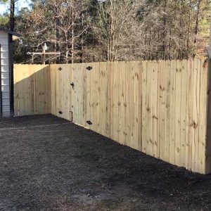 stockade wood fence with gate