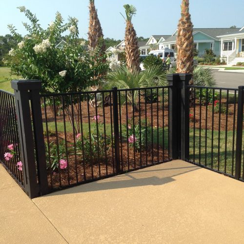 black ornamental fencing around garden